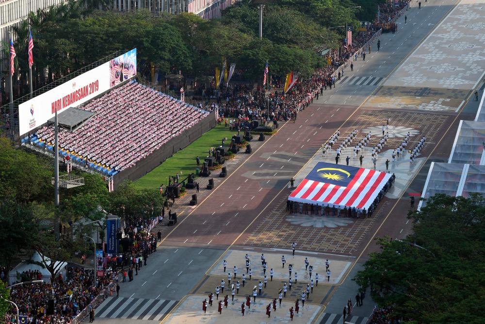 A National Day march takes place Dataran Putrajaya, on Aug 31, 2019. — Bernama