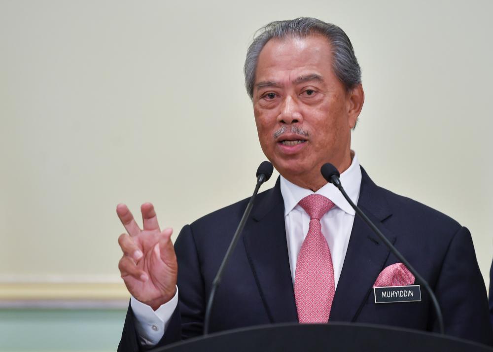 Prime Minister Tan Sri Muhyiddin Yassin during press conference after chairing the new cabinet meeting at the Perdana Putra today.  - Bernama