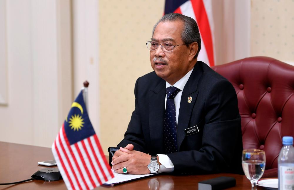 Prime Minister Tan Sri Muhyiddin Yassin talks during the Online Summit Level Meeting of the NAM Contact Group via video-conferencing yesterday. — Bernama