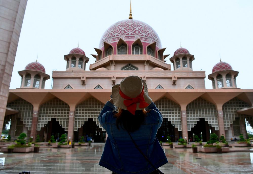 Putra Mosque was today reopened to tourist visits after being closed to visitors since Sunday, following concerns over the coronavirus infection. - Bernama
