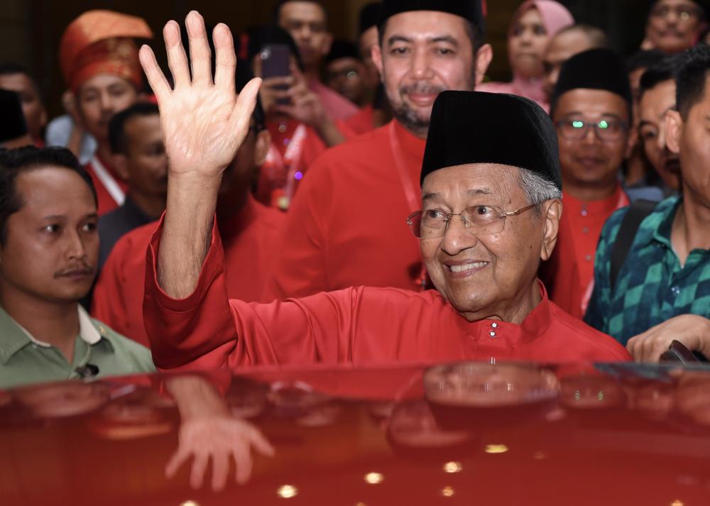 Tun Dr Mahathir Mohamad, chairman of the Parti Pribumi Bersatu Malaysia (Bersatu), leaves after attending the Bersatu Annual General Assembly at the Putrajaya International Convention Centre, on Dec 29, 2018. — Bernama