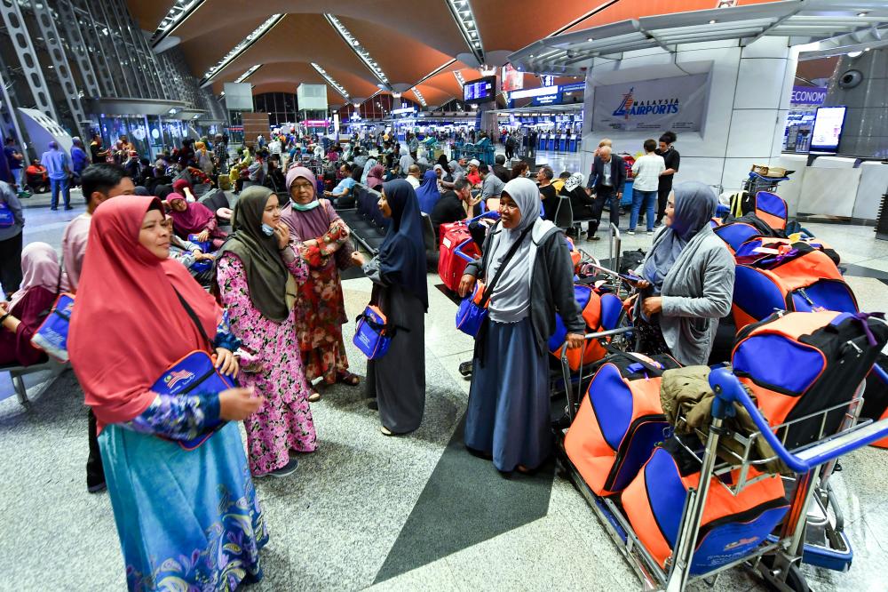 Pilgrims stranded at the Kuala Lumpur International Airport (KLIA), on Feb 27, 2020. — Bernama