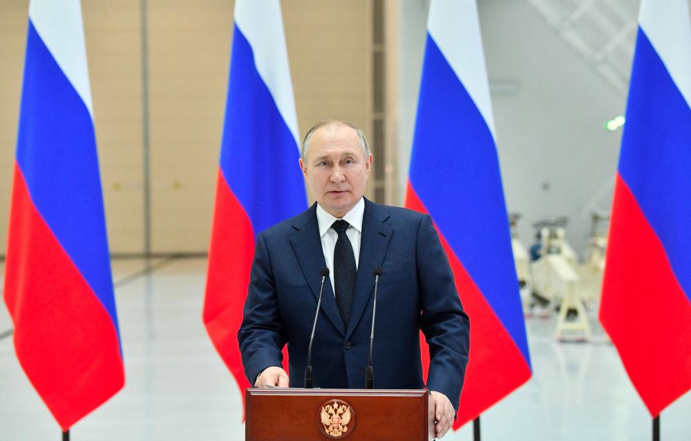 Russian President Vladimir Putin delivers a speech as he visits the Vostochny Cosmodrome in Amur Region, Russia April 12, 2022. Sputnik/Evgeny Biyatov/Kremlin via REUTERSpix