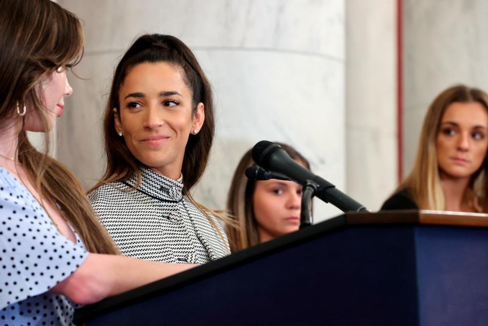 After their day of testimony before the Senate Judiciary Committee gymnasts Maroney, Raisman, Lorincz and Nichols participate in a news conference on Capitol Hill in Washington/REUTERSPix