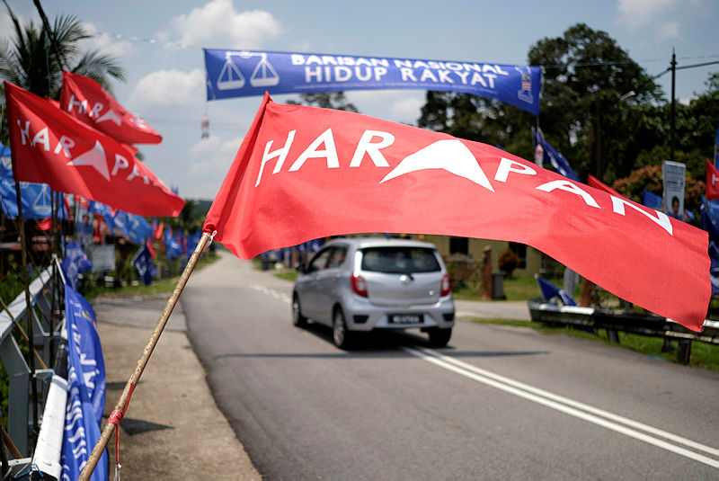 A filepix of the rural town of Bemban, decked in Paktan Harapan (PH) and Barisan Nasional (BN) colours. — Bernama