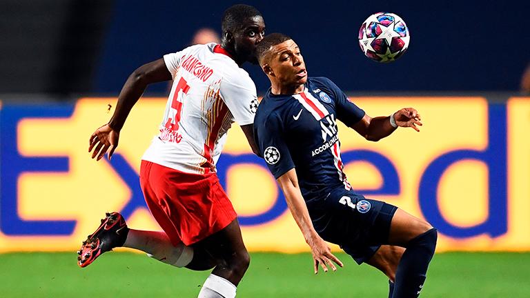 Kylian Mbappe (right) in action against Dayot Upamecano of Leipzig during the Champions League semifinal in Lisbon. – EPAPIX