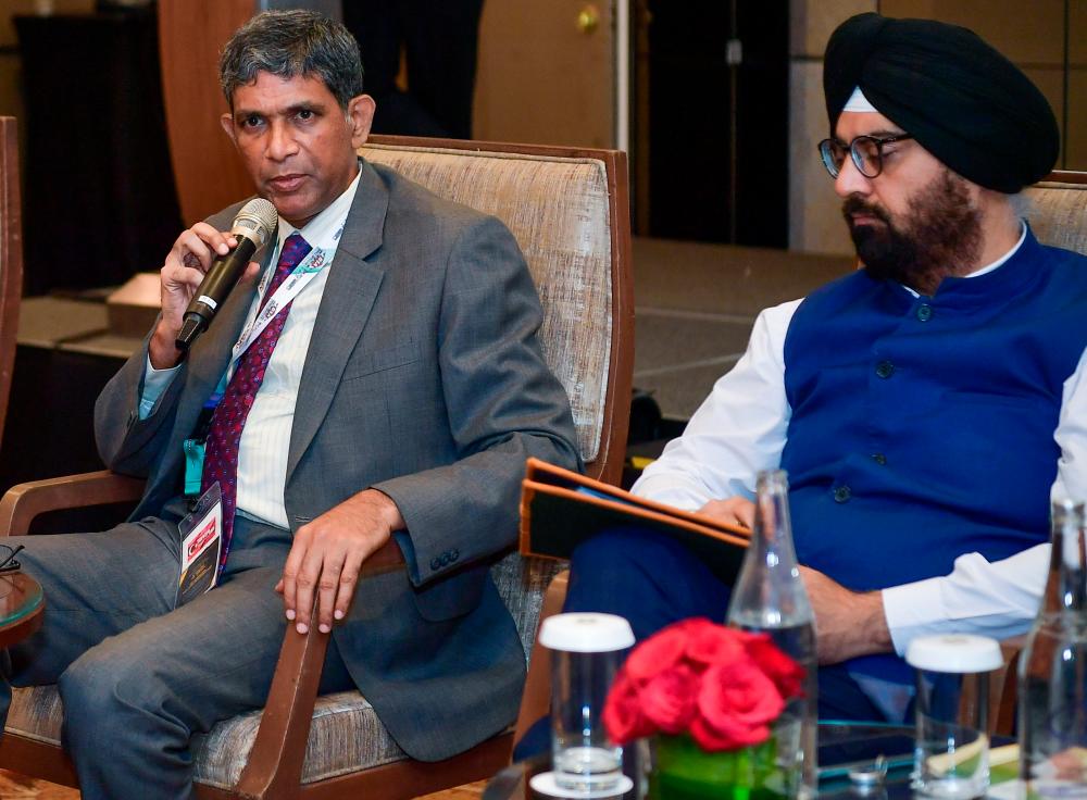 Reddy (left) and Preet Pal Singh at the Roadshow on Opportunities in India’s Food Processing Sector. – Bernamapic