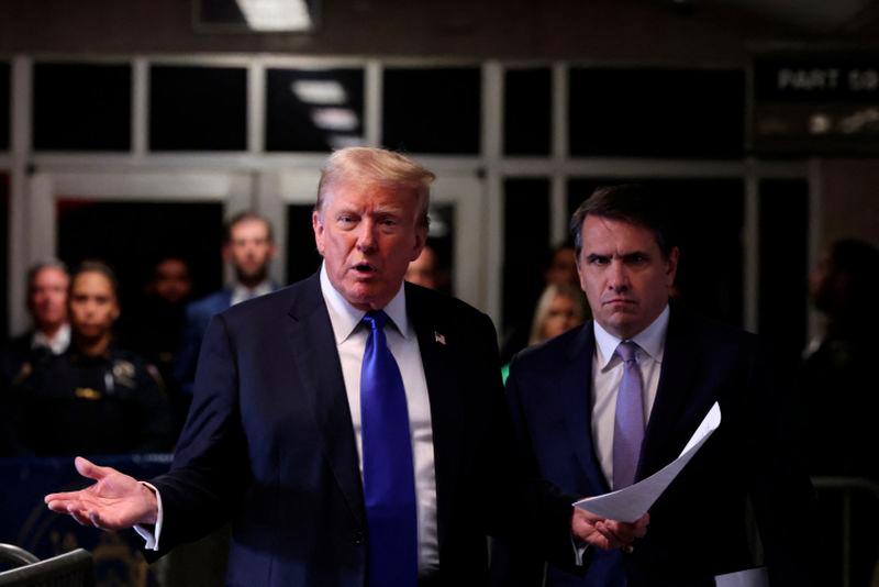 Former U.S. President Donald Trump speaks alongside his attorney Todd Blanche as he arrives for his hush money trial at Manhattan Criminal Court on May 30, 2024 in New York City. - REUTERSPIX