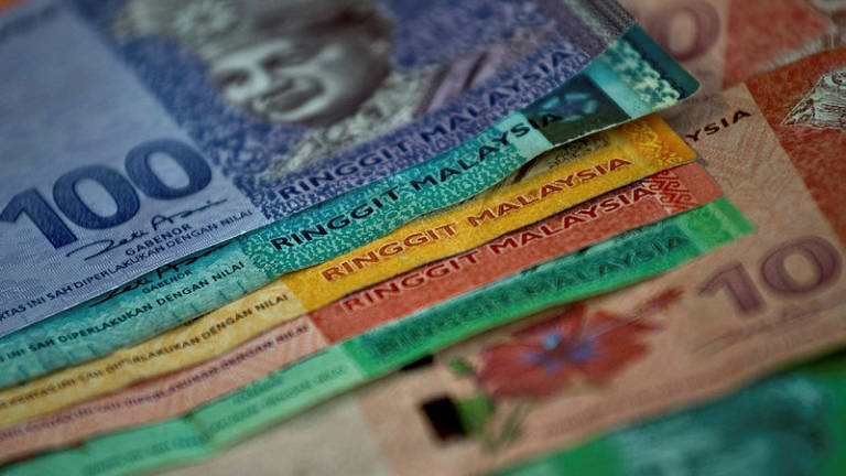 Ringgit rebounds to close higher against US dollar
