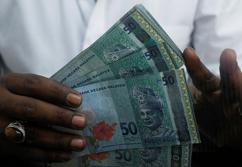 Ringgit lower against US dollar in early trading