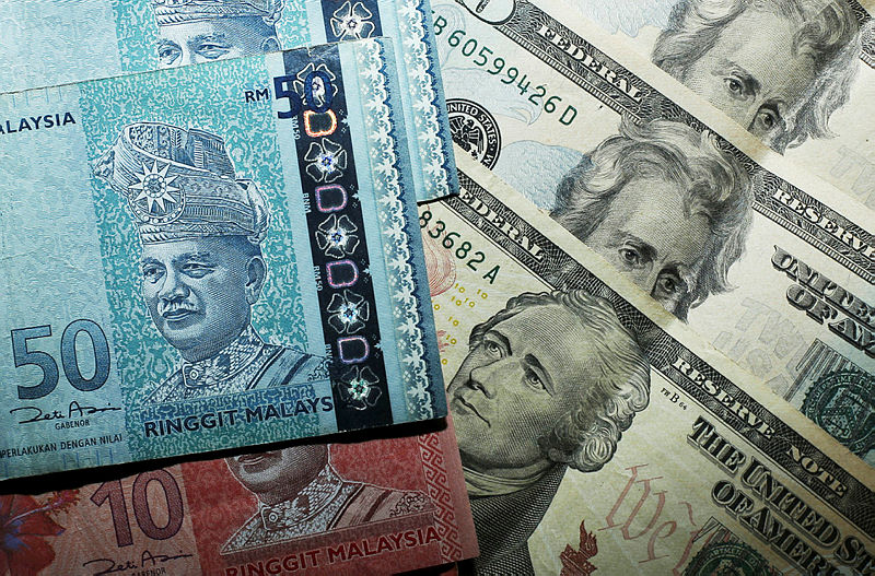 Ringgit easier in early trade on better demand for greenback