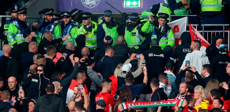General view as Police clash with Hungary fans during the match between Englanf and Hungary. – REUTERSPIX