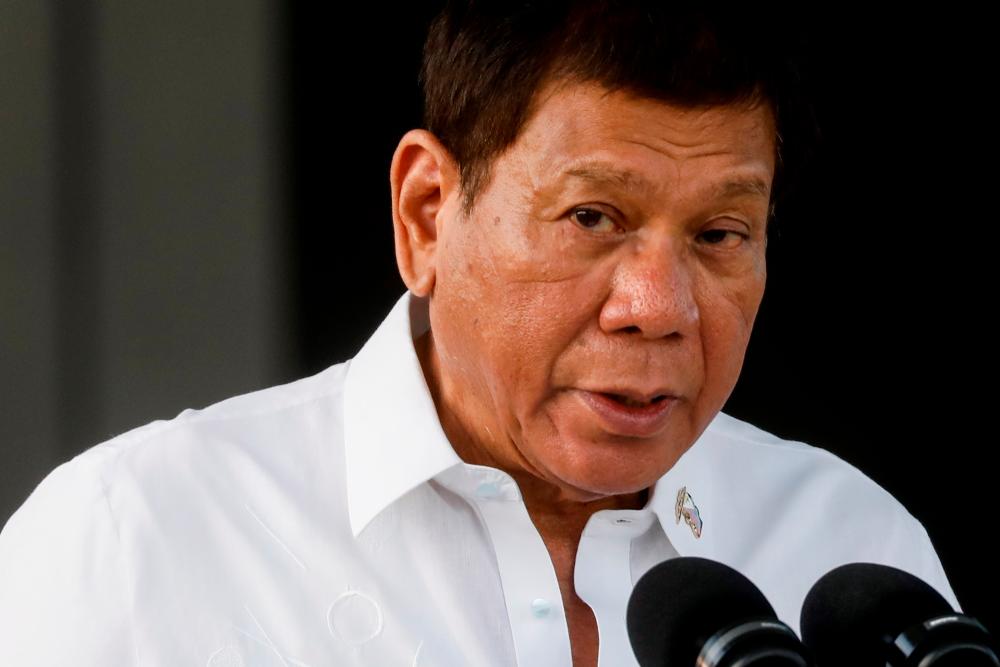 Philippine President Rodrigo Duterte speaks at Villamor Air Base in Pasay, Metro Manila, Philippines, February 28, 2021. — Reuters