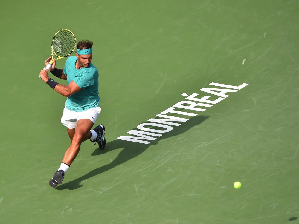 Rafael Nadal of Spain runs for the ball against Daniil Medvedev of Russia during the mens singles final on day 10 of the Rogers Cup at IGA Stadium on August 11, 2019 in Montreal, Quebec, Canada. - AFP