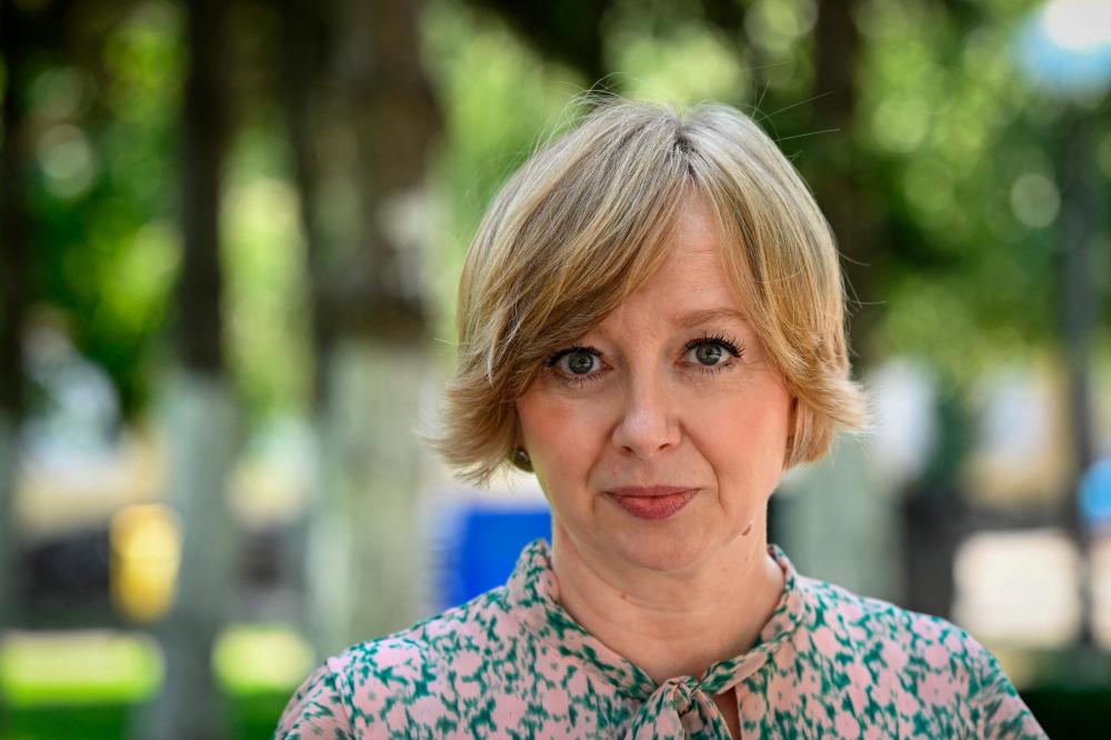 Romanian journalist Emilia Sercan is pictured in Bucharest, Romania, on July 26, 2022. Romanian journalist Emilia Sercan has made it her mission to expose plagiarism at the country’s highest levels. AFPPIX