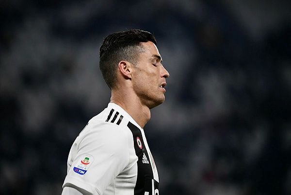 Juventus’ Portuguese forward Cristiano Ronaldo reacts during the Italian Serie A football match Juventus vs Chievo Verona. — AFP