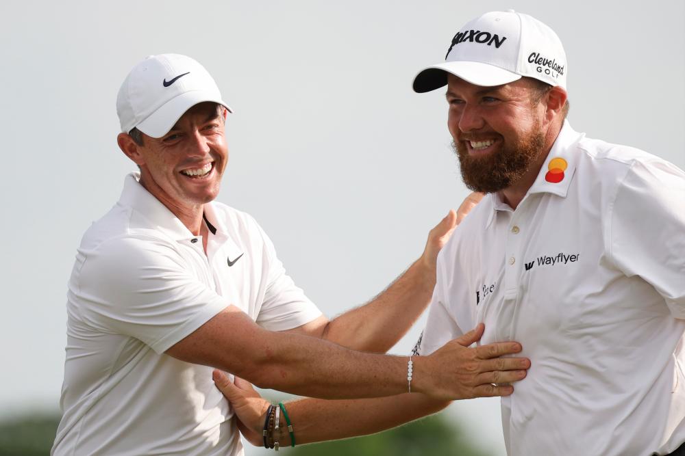 $!Rory McIlroy and Shane Lowry. – Getty Images/PGA Tour
