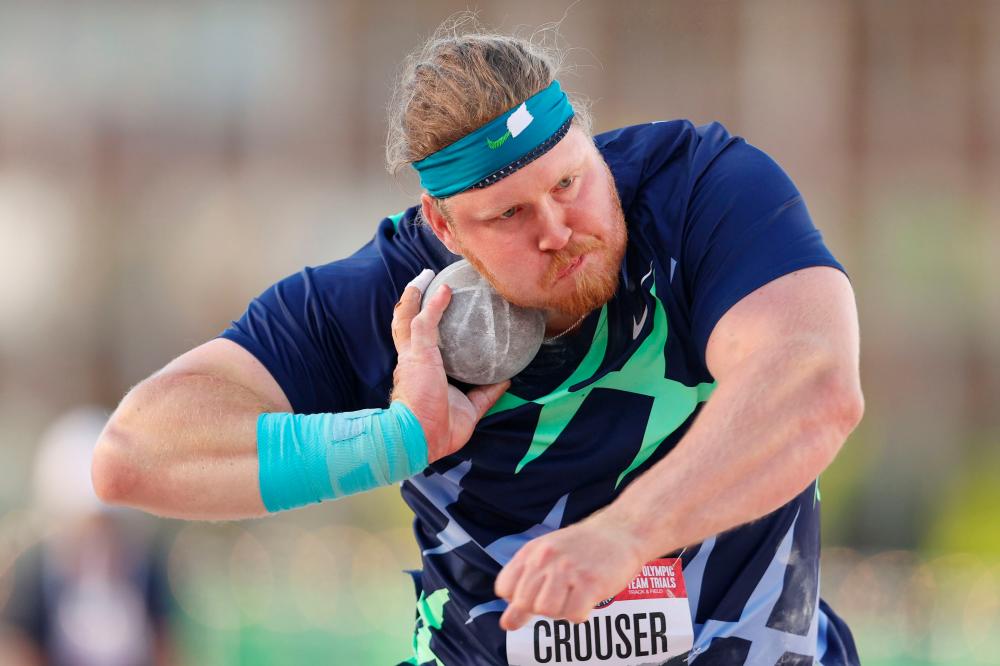 American Ryan Crouser breaks shot put world record
