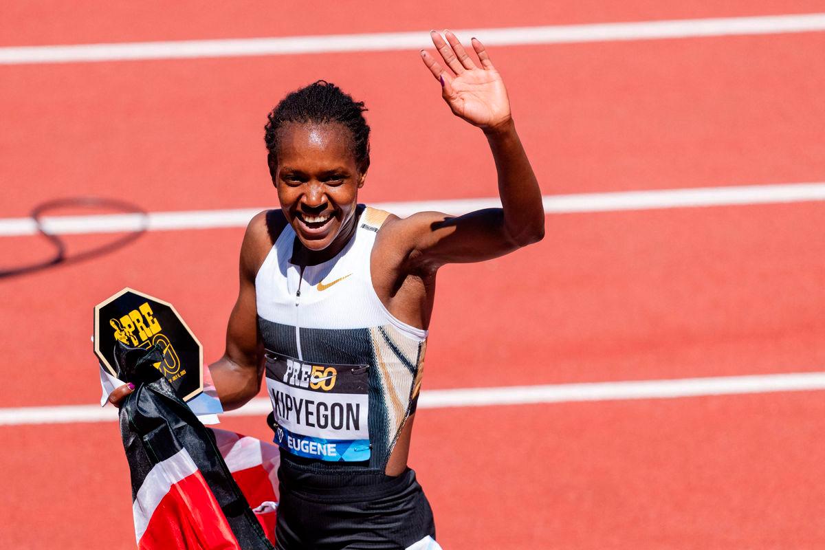 Faith Kipyegon of Kenya waves towards the crowd after winning the Women’s 1500m and setting a new world record during the Prefontaine Classic at Hayward Field on July 5, 2025 in Eugene, Oregon- GETTY IMAGES NORTH AMERICA / AFP