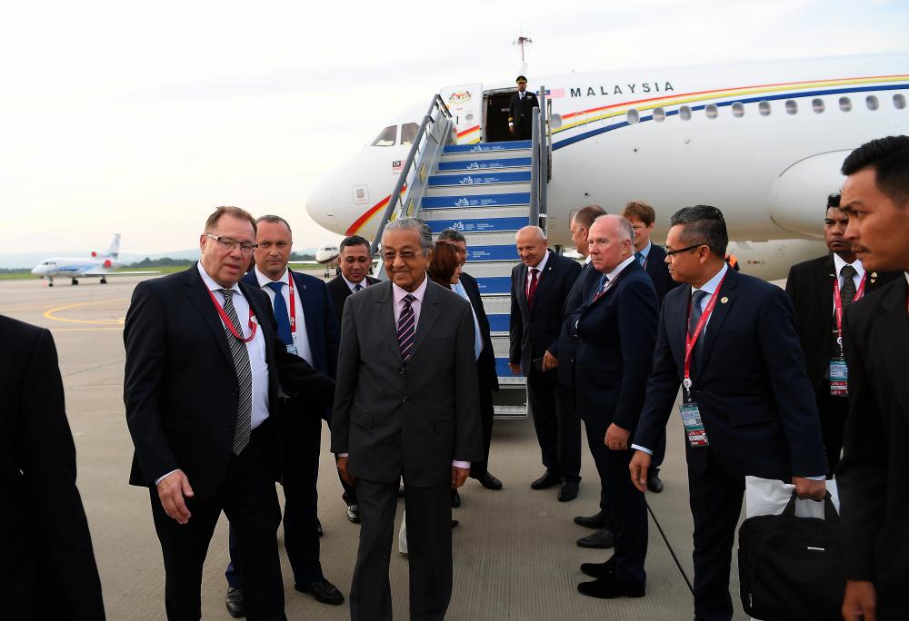 Prime Minister Tun Dr Mahathir Mohamad arrives at Knevichi International Airport for his working visit to Vladisvostok, Russia for the Eastern Economic Forum (EEF) on Sept 4, 2019. - Bernama