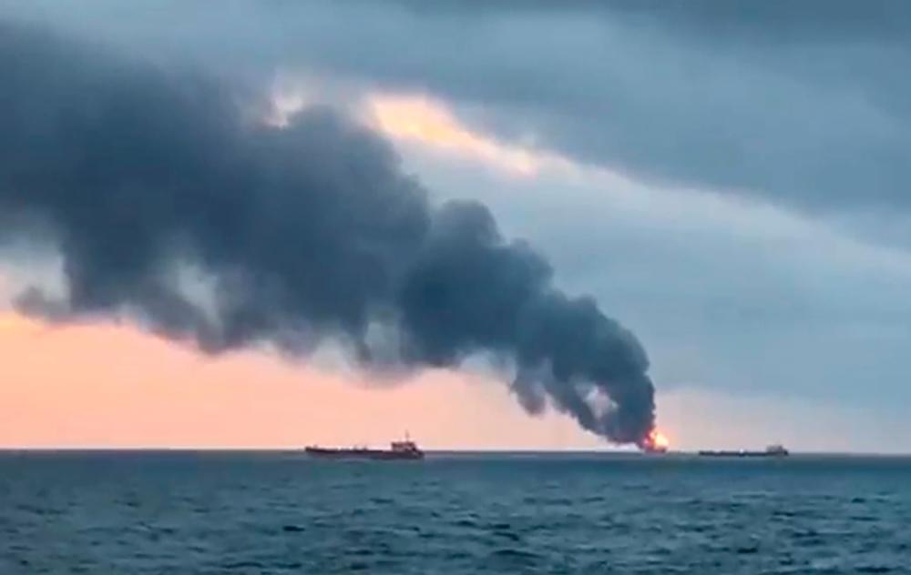 An image grab taken from AFP TV on Jan 21, 2019 shows a burning ship after a fire engulfed at two gas tankers in the Black Sea off Crimea. — AFP