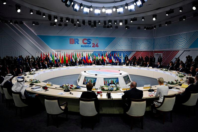 Russia's President Vladimir Putin gives a speech during the extended format meeting of the BRICS summit in Kazan on October 23, 2024. - AFPPIX