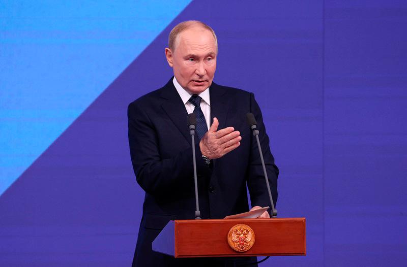 In this pool photograph distributed by Russian state agency Sputnik, Russia's President Vladimir Putin addresses the audience during Moscow City Day celebrations in Moscow on September 7, 2024. - Sergei KARPUKHIN / POOL / AFP)