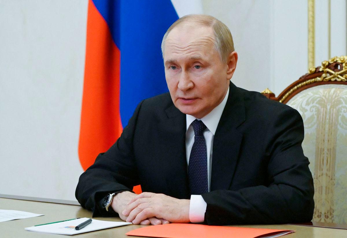 In this pool photograph distributed by the Russian state agency Sputnik, Russia’s President Vladimir Putin chairs a Security Council meeting via a videoconference at the Kremlin in Moscow on August 29, 2025. (Photo by Pavel Byrkin / POOL / AFP)