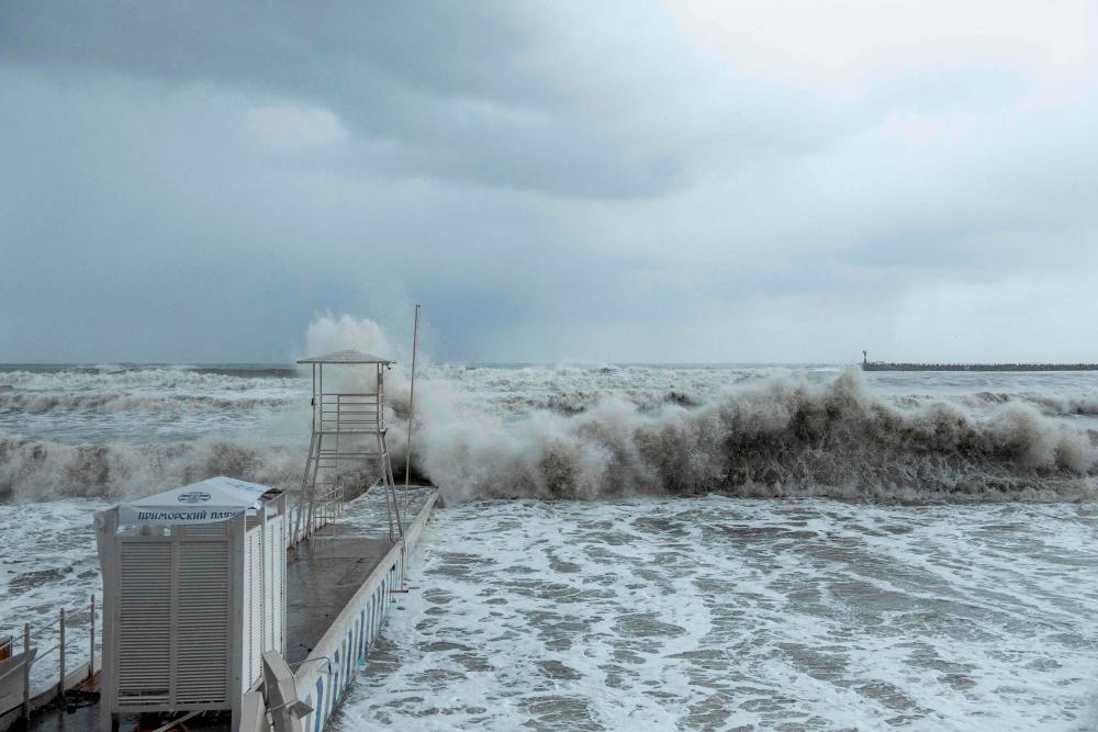 Waves crash against a seafront in the Black Sea resort city of Sochi during a storm on November 27, 2023/AFPPix