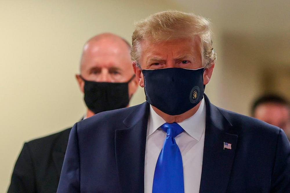 U.S. President Donald Trump wears a mask while visiting Walter Reed National Military Medical Center in Bethesda, Maryland, U.S., July 11, 2020. -Reuters