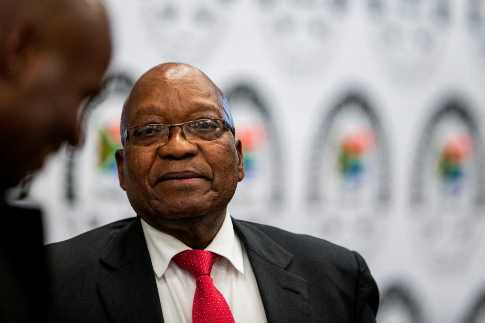 Former South African president Jacob Zuma leaves the Commission of Inquiry into State Capture on July 15, 2019 in Johannesburg, where he faces tough questioning over allegations that he oversaw systematic looting of state funds while in power. — AFP