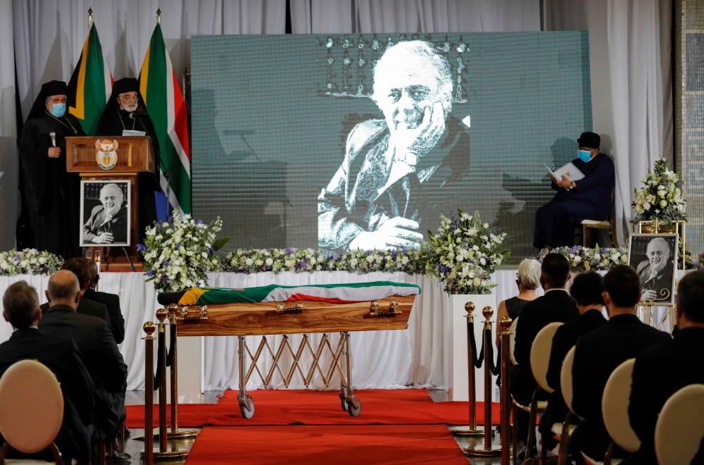 An image of George Bizos is projected during the funeral of George Bizos at the Hellenic Cultural Centre in Johannesburg, South Africa, on September 17, 2020. — AFP