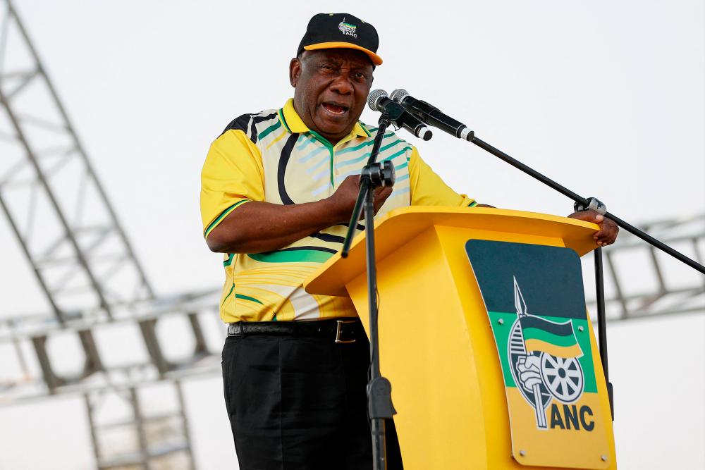 The governing African National Congress (ANC) President Cyril Ramaphosa addresses supporters during their party’s 2019 Manifesto Review Rally at the Dobsonville Stadium in Soweto on September 3, 2023. AFPPIX