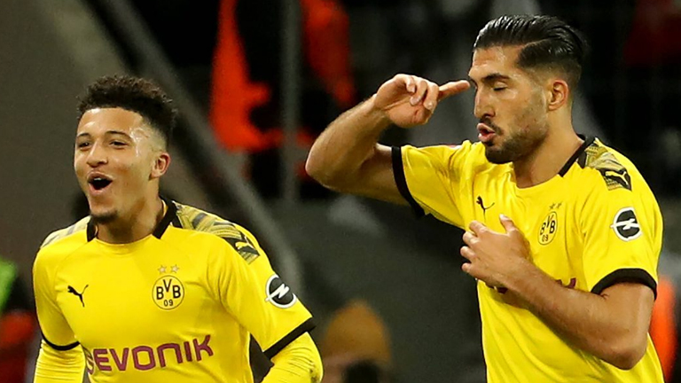 Dortmund’s Jadon Sancho (left) and teammate Emre Can.