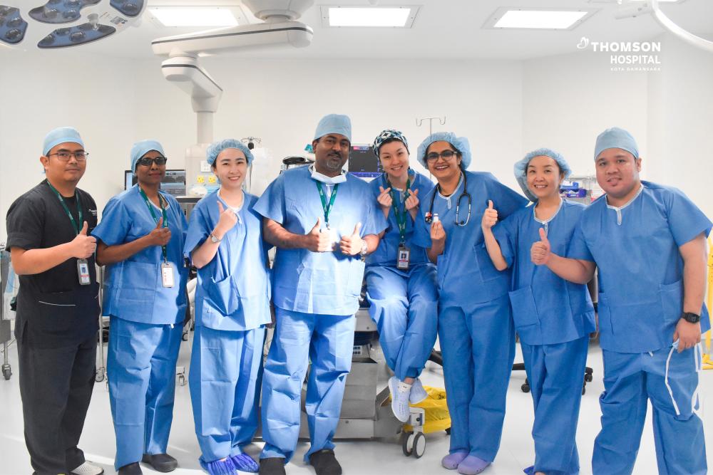 Dr Sivakumaran Jayaram, chief operating officer (Clinical) of Thomson Hospital Kota Damansara (fourth from left), Dr Foo Sze Yuen, consultant Paediatric Anaesthesiologist (fifth from left) and Dr Sangita Dharshini Terumalay, consultant Paediatrician &amp; Paediatric Neurologist (third from right) capture this historical moment with supporting pharmaceutical and medical staff.