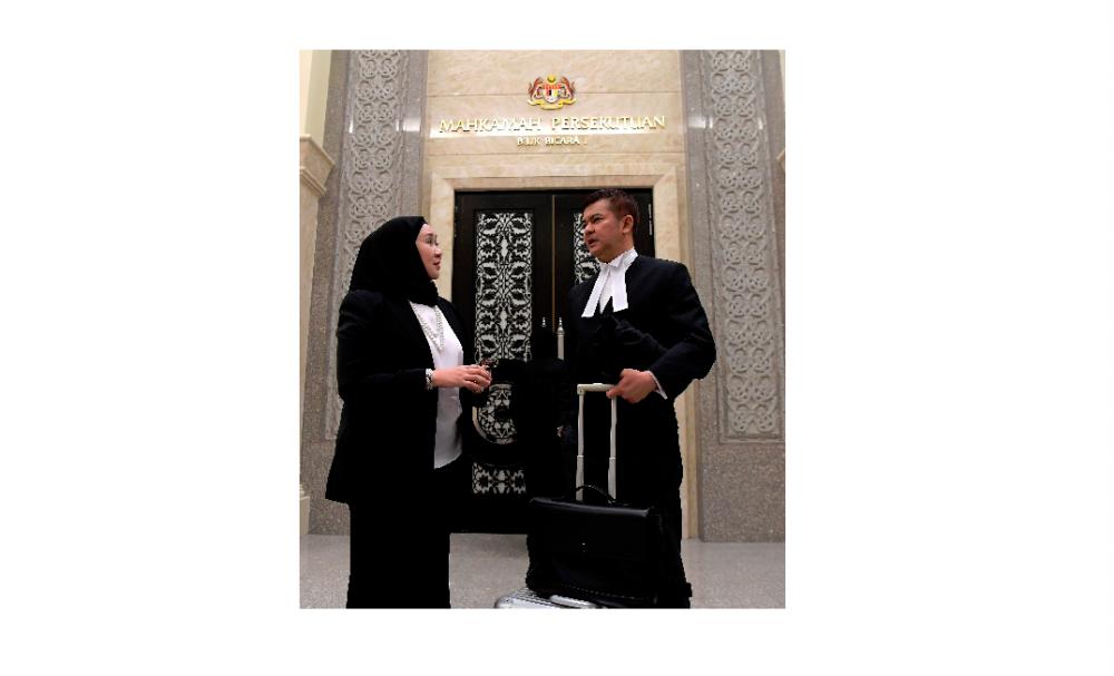 Filepix of Sarawak’s Law, State-Federal Relations and Project Monitoring Assistant Minister Sharifah Hasidah Sayeed Aman Ghazali (L) and Sarawak Chief Judge Datuk Talat Mahmood Abd Rashid.