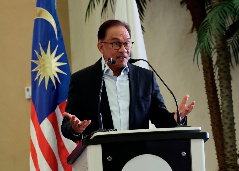 Prime Minister Datuk Seri Anwar Ibrahim delivering his speech during Islamic Development Bank Business Community Programme/BERNAMAPIX
