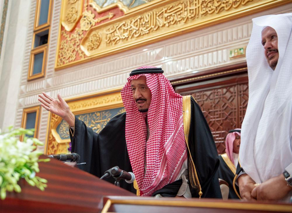 A handout picture provided by the Saudi Royal Palace on Nov 20, shows Saudi Arabia's King Salman bin Abdulaziz greeting the Shura council, a top advisory body, in the capital Riyadh. — AFP
