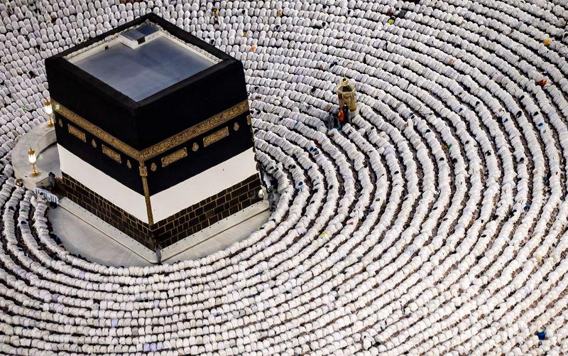 Muslim worshippers pray around the Kaaba, Islam's holiest shrine, at the Grand Mosque in Saudi Arabia's holy city of Mecca ahead of the annual Hajj pilgrimage - AFPpix