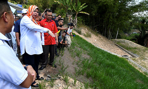 Rural Development Minister Datuk Seri Rina Mohd Harun during an inspection of a finished slope repair project at the Kampung Limbanak Kemas Kindergarten, Penampang on April 7, 2019. — Bernama