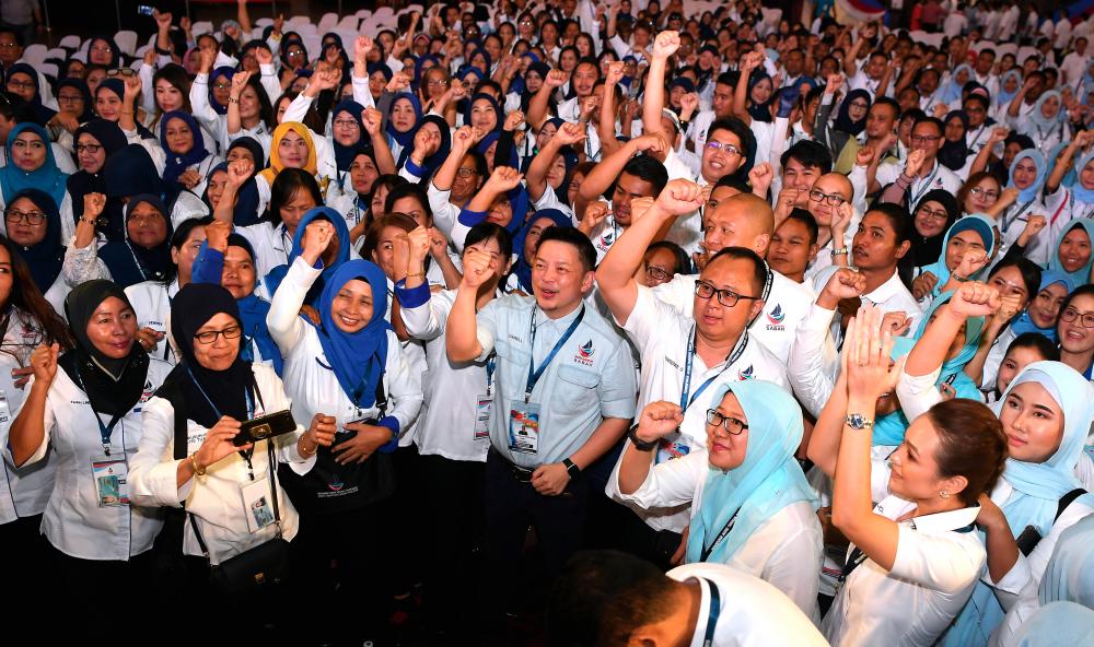 Parti Warisan Sabah (Warisan) deputy president Datuk Darell Leiking with other party representatives, attends the launching of the party’s Wira, Wirawati and Wanita Warisan convention at Kota Kinabalu on May 4, 2019. - Bernama