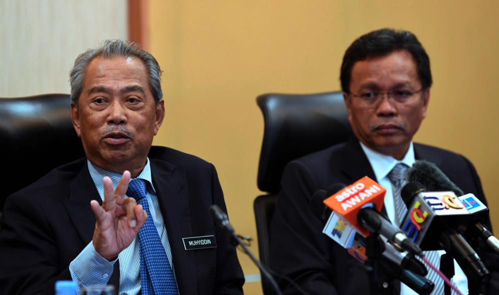 Home Minister Tan Sri Muhyiddin Yassin speaks at a press conference after chairing a holding committee meeting with Sabah Chief Minister Datuk Seri Mohd Shafie Apdal in Kota Kinabalu on Sept 6, 2019. - Bernama