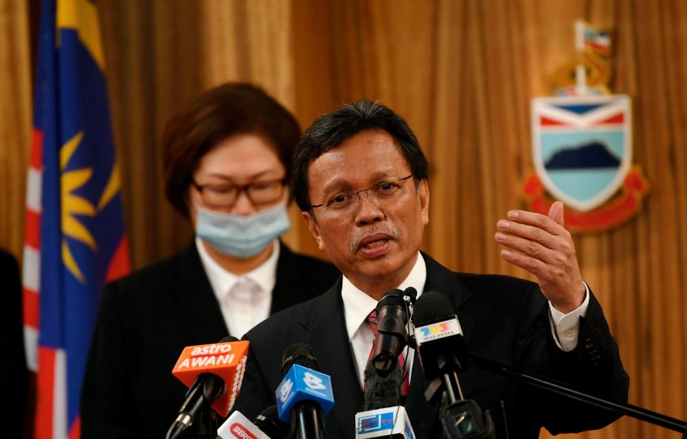 Sabah Chief Minister Datuk Seri Mohd Shafie Apdal speaking at a press conference after handing over of medical supplies for schools in Sabah yesterday. — Bernama