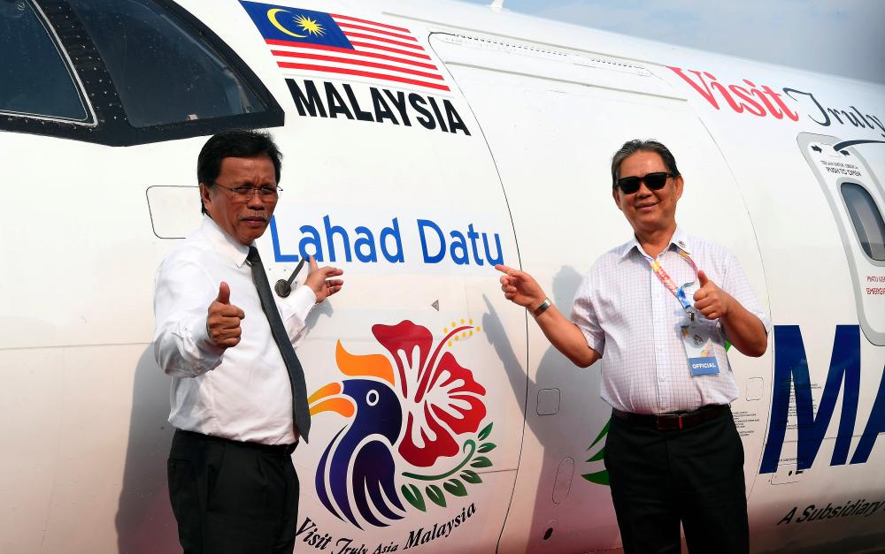 Sabah Chief Minister Datuk Seri Mohd Shafie Apdal (L) with Tourism, Arts and Culture Minister Datuk Mohamaddin Ketapi at the launch of the Maswings Visit Malaysia 2020 programme at the Kota Kinabalu International Airport on Sept 19, 2019. - Bernama