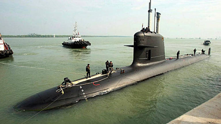 Malaysia’s first submarine,‘KD Tunku Abdul Rahman’, docks in Port Klang outside Kuala Lumpur, Malaysia, on Sept 3, 2009.