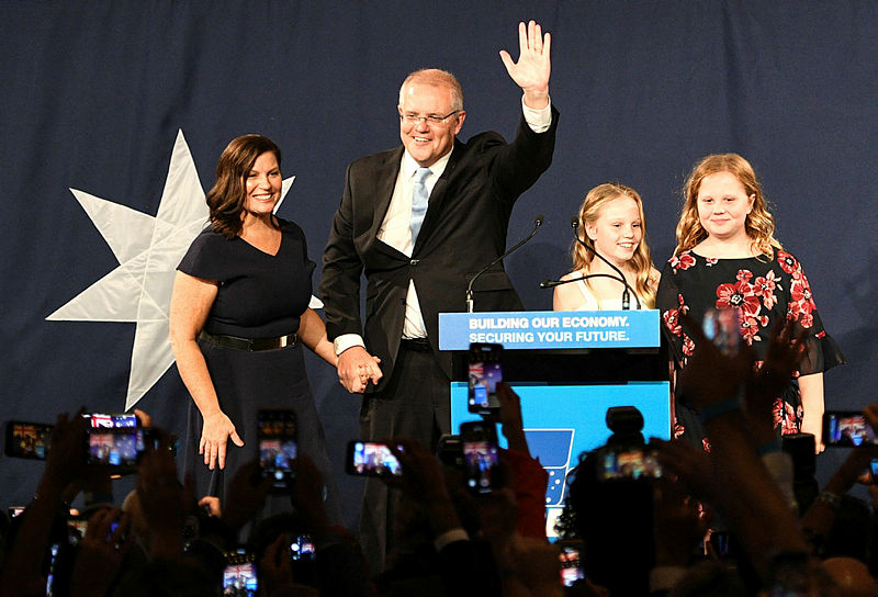 Australia’s newly elected Prime Minister Scott Morrison (C) arrives to deliver a victory speech with his family after winning the Australia’s general election in Sydney on May 18, 2019. — AFP