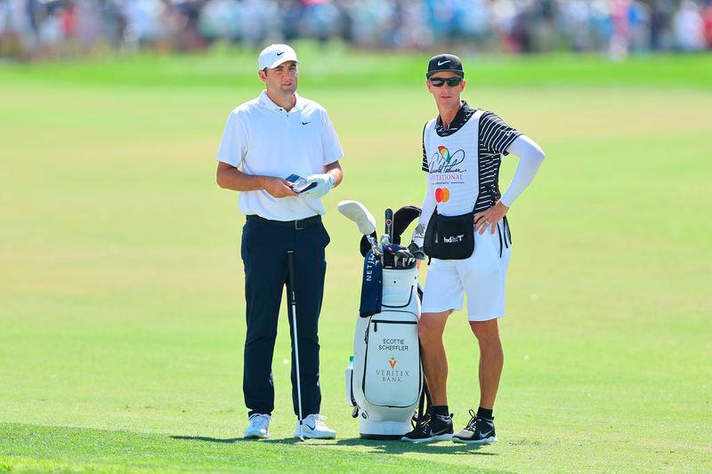 Scottie Scheffler and caddie Ted Scott. Credit Getty Images