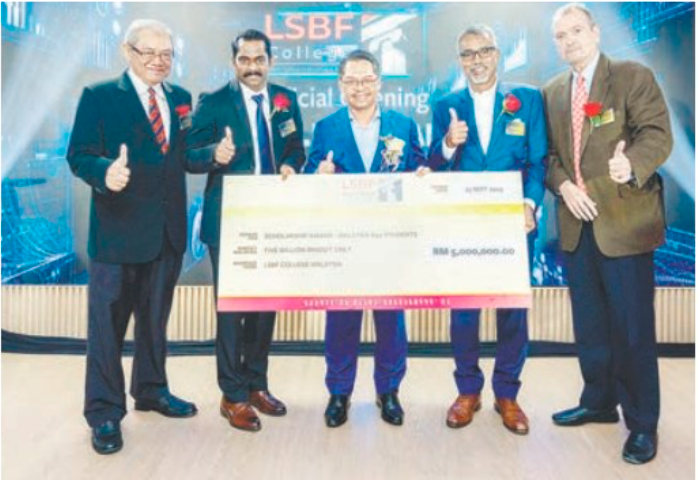 (From left) LSBF College Malaysia Director of Governance and Leadership Tan Sri Ghauth Jasmon, LSBF College Malaysia Director Dr Sajilal, Deputy Higher Education Minister Mustapha, LSBF Global CEO Rathakrishnan Govind and LSBF Global Chairman Alan Diaz, with a mock scholarship cheque of RM5 million at the launch of LSBF in KL.