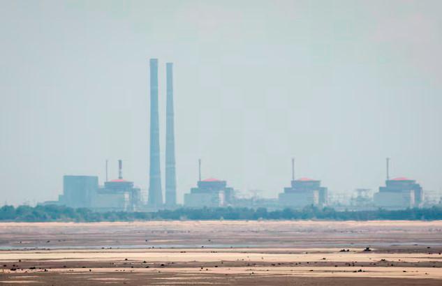 A view shows the Zaporizhzhia Nuclear Power Plant from the bank of Kakhovka Reservoir near the town of Nikopol amid Russia’s attack on Ukraine, in the Dnipropetrovsk region, Ukraine, June 16, 2023. - REUTERSPIX