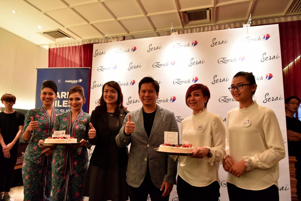 Lau (third from left) and Najib (fourth from left) at the Enrich and Serai Group partnership event.